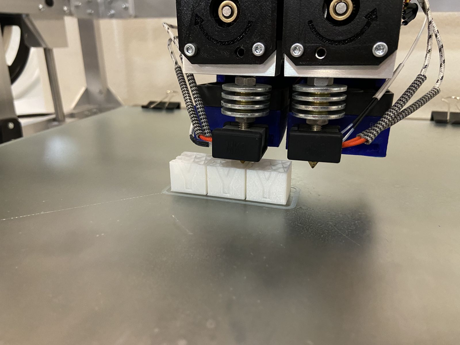 Doppio estrusore simmetrico